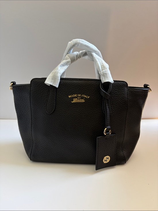 Gucci Handbags - Gucci Black Pebbled Leather Tote with Gold Logo